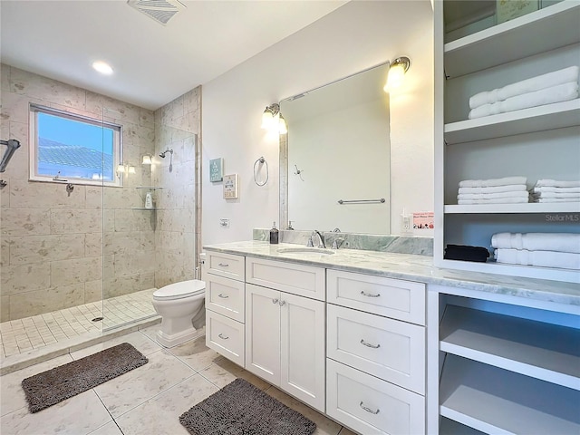 full bath featuring toilet, visible vents, a walk in shower, and vanity