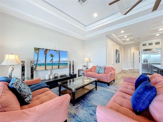 living area with baseboards, visible vents, and recessed lighting