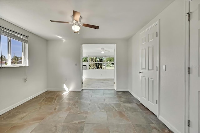 interior space featuring plenty of natural light and baseboards