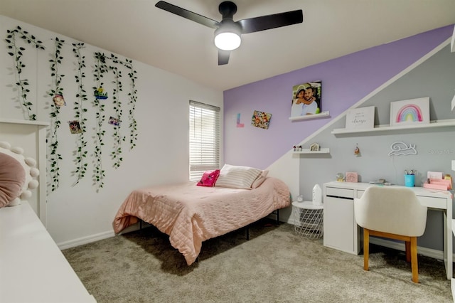 bedroom with ceiling fan, carpet flooring, and baseboards