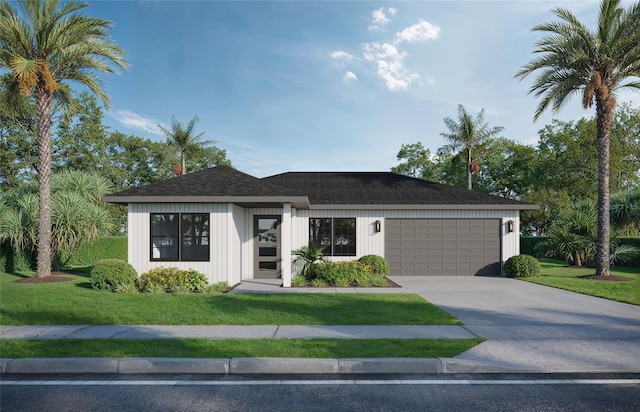 view of front of house featuring a garage, roof with shingles, concrete driveway, and a front yard