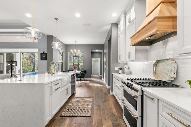 kitchen featuring dark wood finished floors, custom exhaust hood, white cabinetry, double oven range, and dishwasher