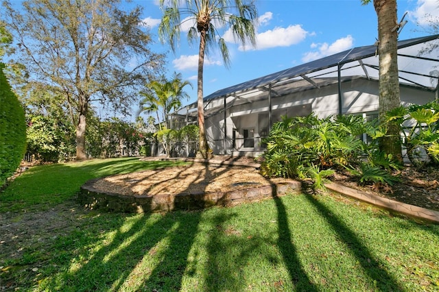 view of yard featuring a lanai