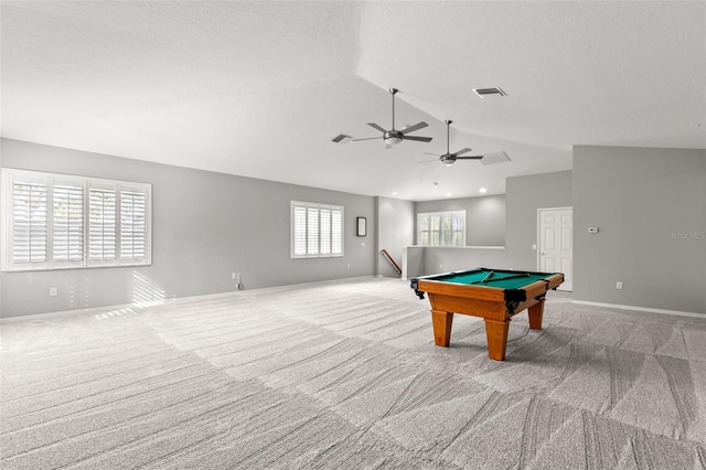 rec room featuring lofted ceiling, carpet flooring, visible vents, and baseboards