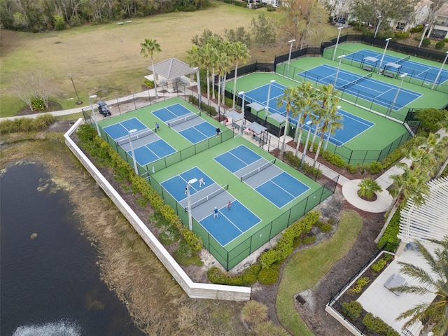 birds eye view of property featuring a water view