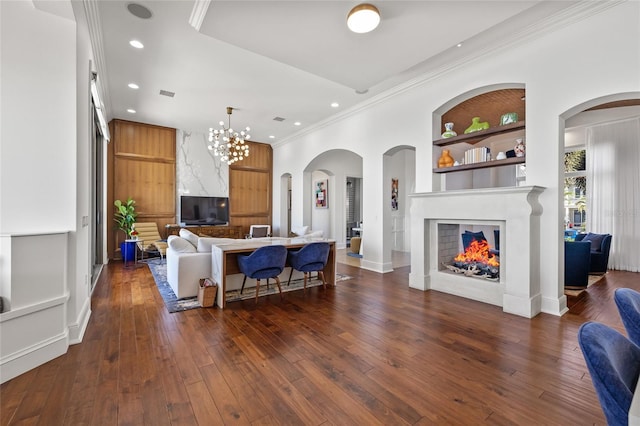 living area featuring recessed lighting, dark wood-style flooring, crown molding, and a multi sided fireplace