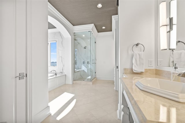 bathroom with a marble finish shower, ornamental molding, a garden tub, vanity, and recessed lighting