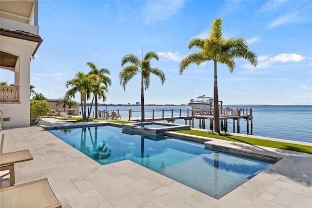 view of pool with boat lift, a water view, a pool with connected hot tub, a dock, and a patio area