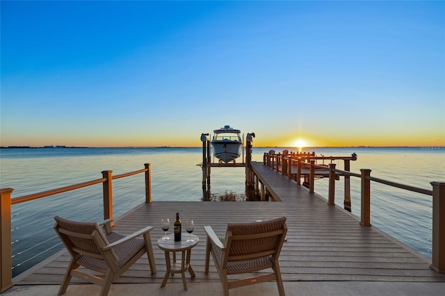 dock area featuring a water view