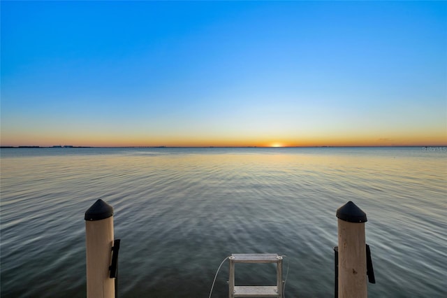 dock area featuring a water view