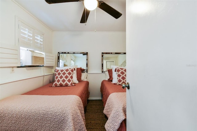 bedroom featuring carpet and a ceiling fan