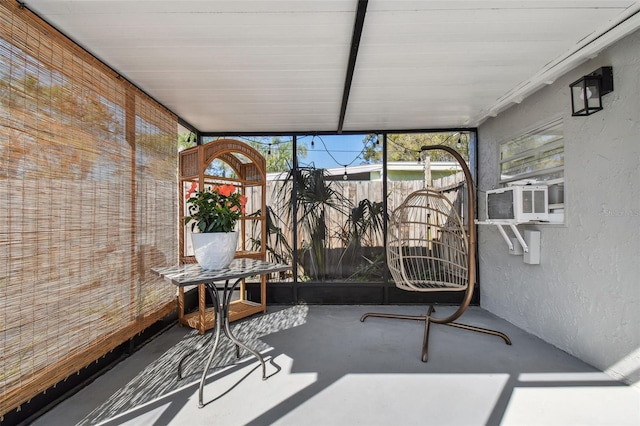 unfurnished sunroom featuring cooling unit