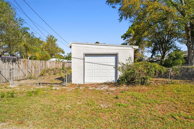 garage featuring fence