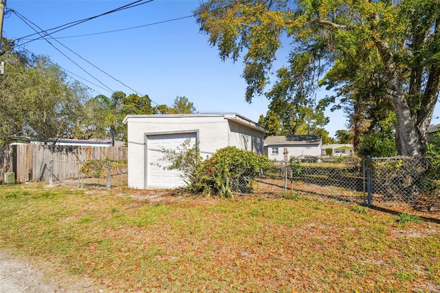 exterior space featuring fence and an outdoor structure