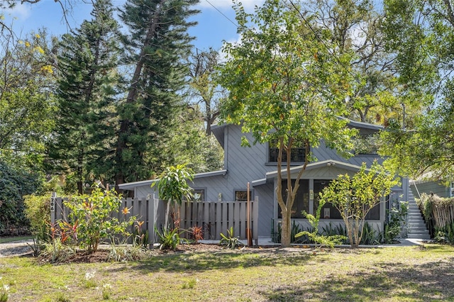 exterior space featuring a yard and fence