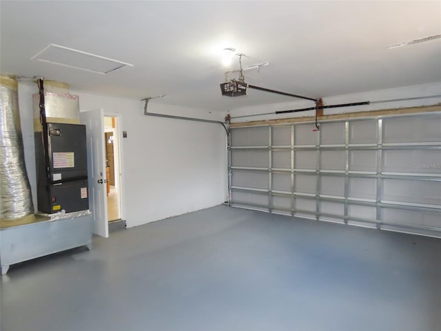 garage with heating unit and a garage door opener