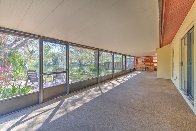 unfurnished sunroom featuring a healthy amount of sunlight