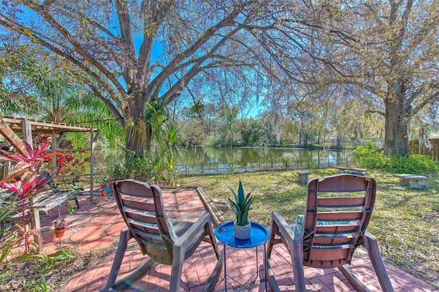 view of patio / terrace featuring a water view