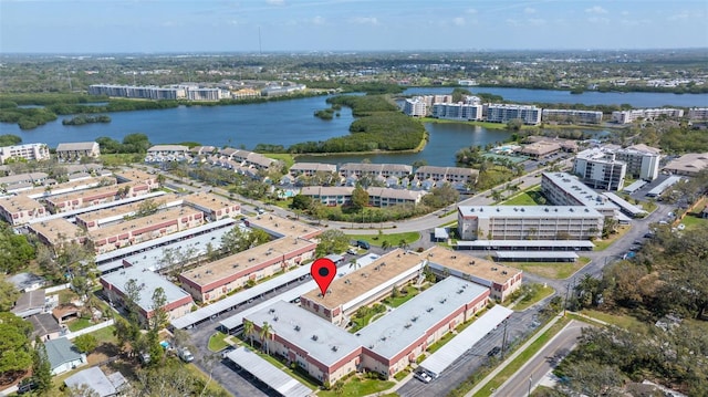 drone / aerial view with a water view