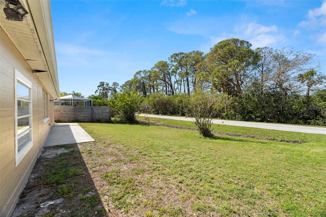 view of yard featuring fence