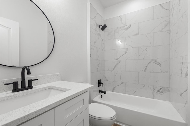 full bath featuring washtub / shower combination, vanity, and toilet