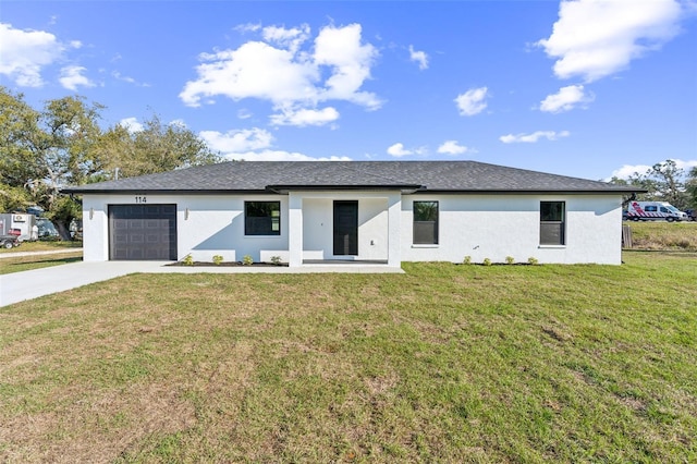 view of front of home with a garage, driveway, a front lawn, and stucco siding