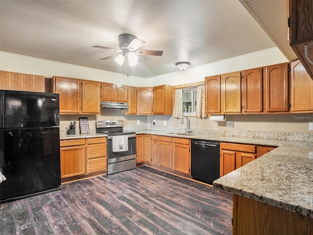 kitchen featuring ceiling fan, under cabinet range hood, dark wood-type flooring, a sink, and black appliances