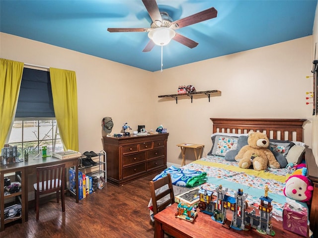 bedroom with a ceiling fan and wood finished floors