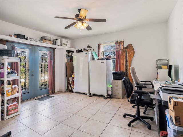 home office with a ceiling fan, french doors, and light tile patterned floors