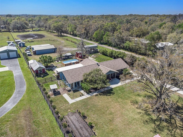 drone / aerial view with a view of trees