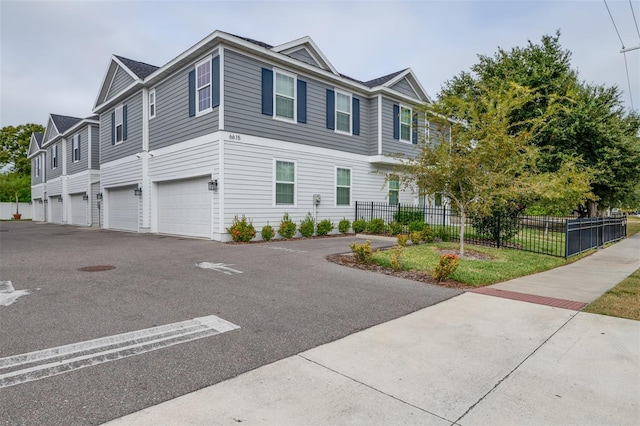 view of front of property with fence