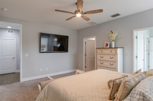 bedroom featuring a ceiling fan, baseboards, visible vents, and carpet flooring