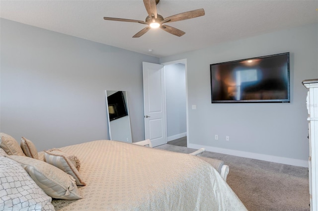 bedroom featuring carpet flooring, ceiling fan, and baseboards