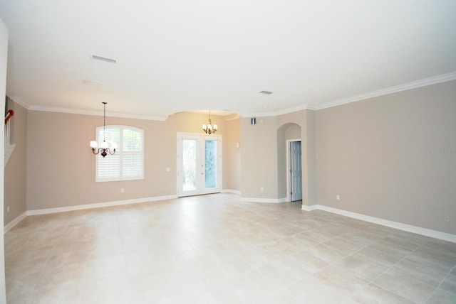 5115 Abisher Wood Ln, Brandon, FL 33511 - unfurnished room featuring a chandelier, arched walkways, ornamental molding, and baseboards