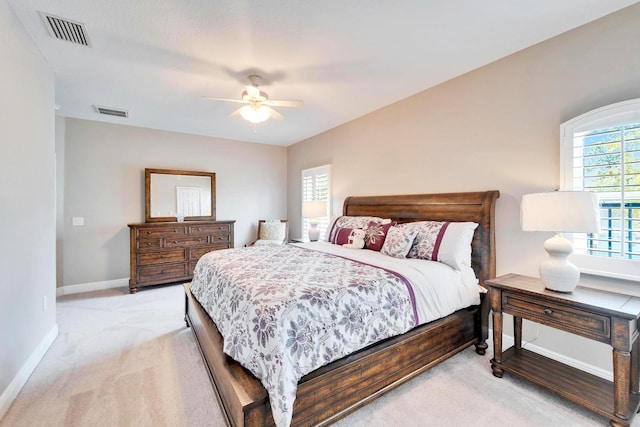 5115 Abisher Wood Ln, Brandon, FL 33511 - bedroom with light carpet, baseboards, and ceiling fan