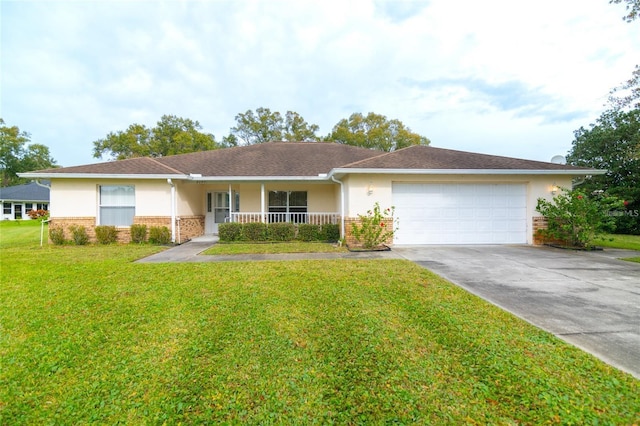 ranch-style home with stucco siding, a front lawn, a porch, and brick siding