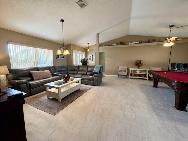 living area featuring billiards, visible vents, lofted ceiling, ceiling fan, and a textured ceiling