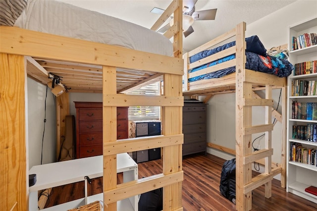 bedroom featuring wood finished floors