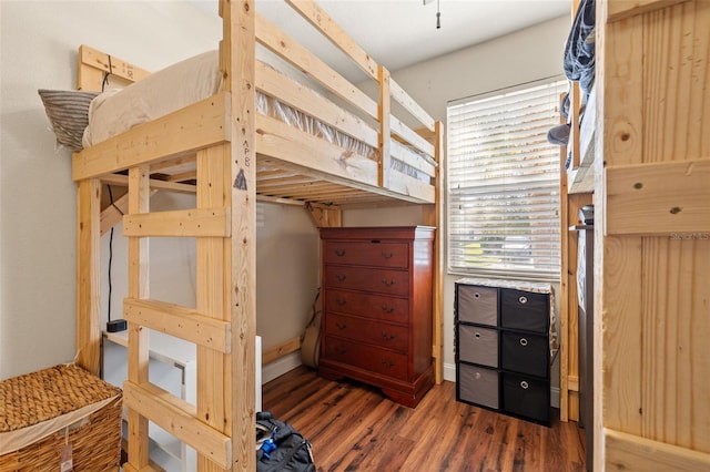 bedroom featuring wood finished floors