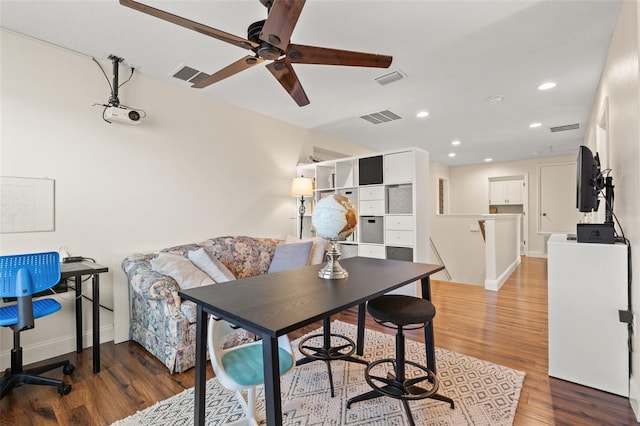 12225 Lake Blvd, New Port Richey, FL 34655 - dining space with a ceiling fan, wood finished floors, recessed lighting, and baseboards
