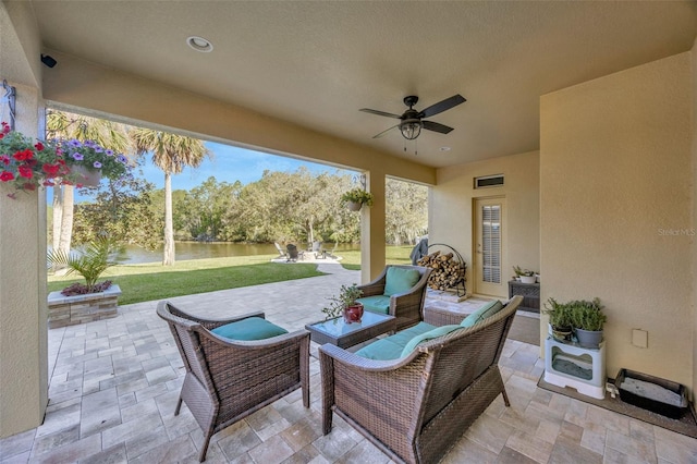 view of patio / terrace with visible vents, outdoor lounge area, and ceiling fan