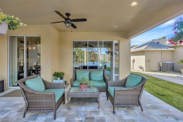 view of patio featuring an outdoor hangout area, central AC unit, and a ceiling fan