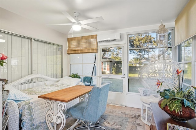 sunroom featuring a ceiling fan and a wall unit AC