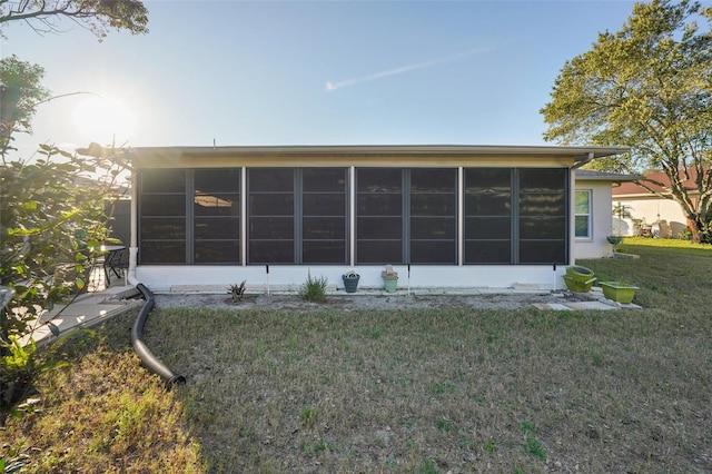 exterior details featuring stucco siding