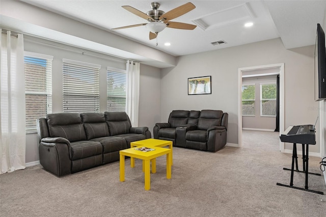 carpeted living area with recessed lighting, a ceiling fan, visible vents, baseboards, and attic access