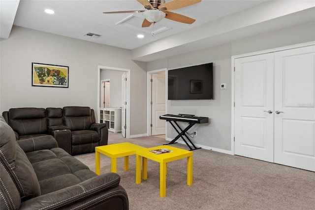 carpeted living room featuring baseboards, visible vents, ceiling fan, and recessed lighting