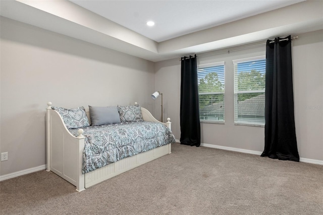 bedroom with carpet and baseboards