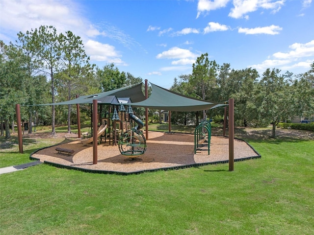 community playground featuring a lawn