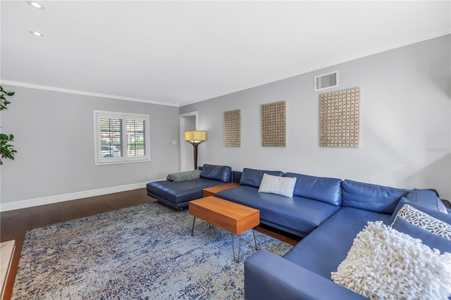 living area with recessed lighting, wood finished floors, visible vents, baseboards, and crown molding