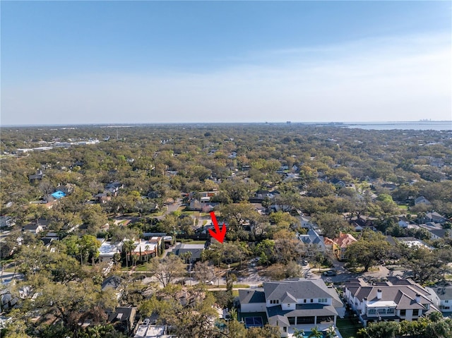 bird's eye view featuring a water view and a residential view